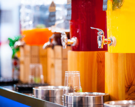 Fresh fruit juice tanks in confectionery shop