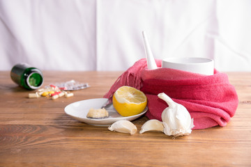 concept of healthy new and old ways of healing on a white background and wooden table