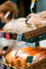 Fresh breads on shelf in bakery shop