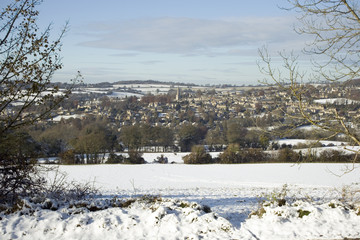 Winter sunshine on Painswick in snow, Gloucestershire, Cotswolds, UK