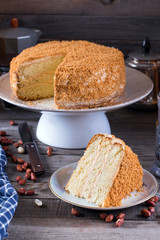Sponge cake with cream and peanuts