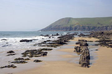 Fototapeta na wymiar UK, Wales, Pembrokeshire, Manorbier Bay beach in spring sunshine
