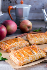 Homemade cakes and puff pastry with apples and caramel
