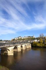 Fototapeta na wymiar Chinon town and chateau seen beyond the bridge over the Vienne Rive, Indre-et-Loire, France