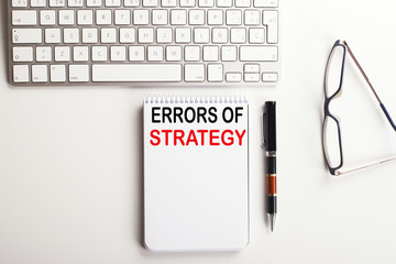 Background of workplace with the concept of Errors of strategy. Business.