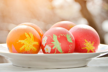 Easter eggs on the windowsill. Children's drawing. sunlight