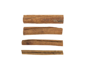 big and small stick of cinnamon on white background