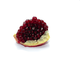 pieces of pomegranate isolated on white background. View from above. Flat pattern