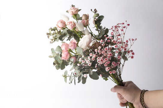 Ranunculus and pink flowers isolated on white background