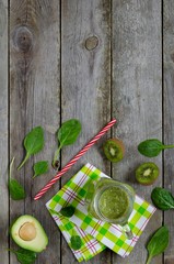Freshly prepared smoothies of avocado, kiwi, spinach, banana