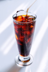 cold brew coffee in a tall glass, black ice coffee