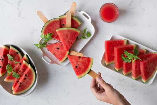Delicious watermelon summertime snack on a plate. Dessert. Flat lay, top view.