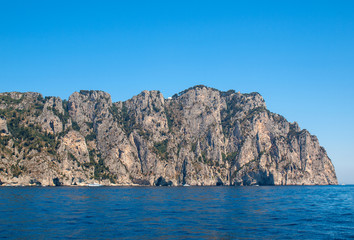 The Island of Capri is a very picturesque, luxuriant and extraordinary location in Italy famous for its high rocks.