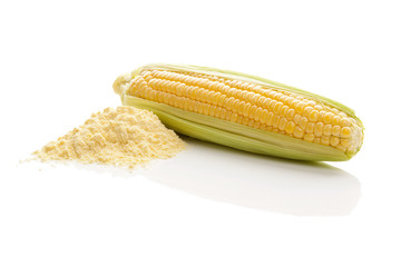 Corn flour and corn cob isolated on white. © Eskymaks