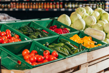 close up view of arranged fresh vegetables in grocery shop