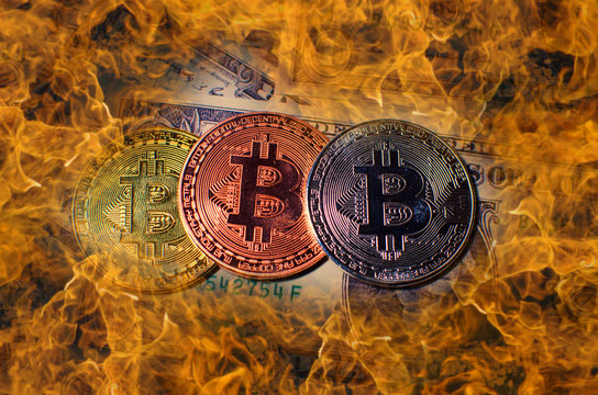 Gold, silver and Bronze burning Bitcoin