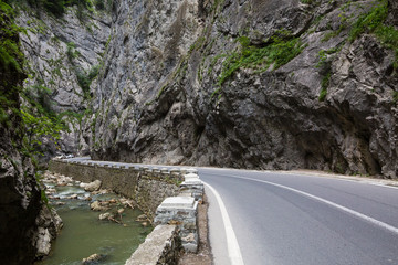 Road in mountains. Bicaz Canyon is one of the most spectacular roads in Romania - Carpathian Mountains, Cheile Bicazului