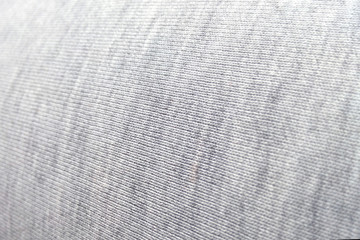 Fabric texture white blurred close-up sunlight