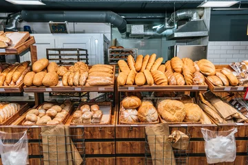 Gordijnen close up view of freshly baked bakery in hypermarket © LIGHTFIELD STUDIOS