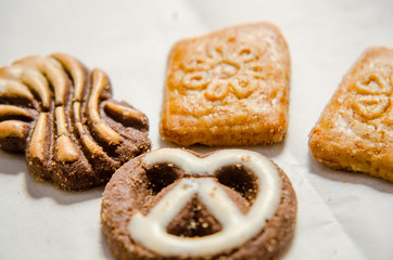 assorted cookies on wooden tray
