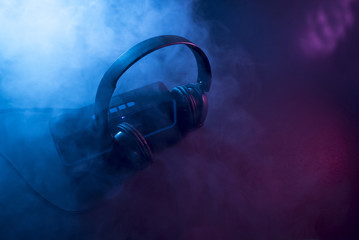 Music concept. Speaker and headphones isolated