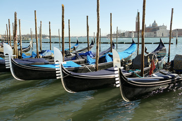 Italy, Venice, gondolas on the Lagoon of Venice and in the background San Giorgio Maggiore