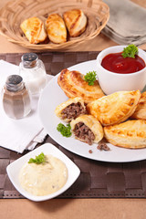 empanada with beef and sauce