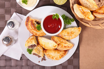 empanada with beef and sauce