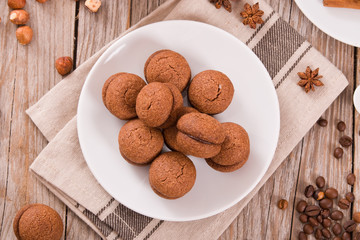 Hazelnut shortbread sandwiches filled with chocolate cream. 