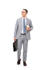 handsome adult businessman with paper cup of coffee and briefcase isolated on white