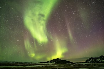 Aurora borealis on a mountain in Iceland 2