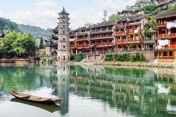 Fototapeta premium The Wanming Pagoda reflected in water of the Tuojiang River