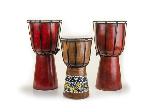Wooden african handmade djembe drum on white
