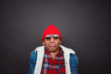 Trendy man looking in disapproval