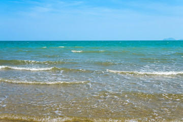Fototapeta na wymiar sea sand and blue sky background