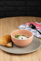 Mushroom cream soup and champignon in bowl