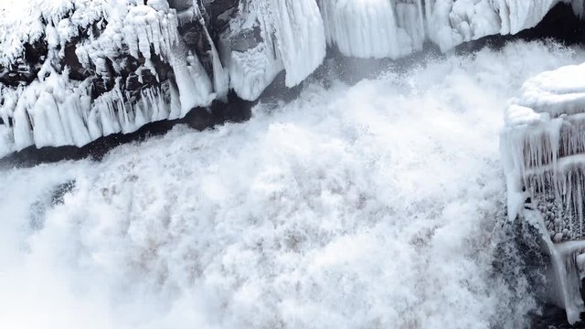 water flows down from the glacier with a swift stream