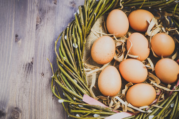 Eggs In The Natural Decor Craft Paper Wooden Background Wreath Of Branches Willow Happy Easter Cozy Rustic Style Vintage Toned 