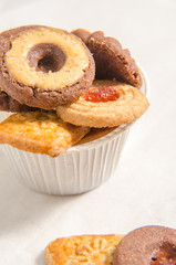 assorted cookies on wooden tray