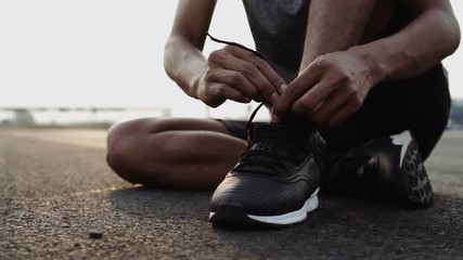 The man with runner be running for exercise. - Powered by Adobe