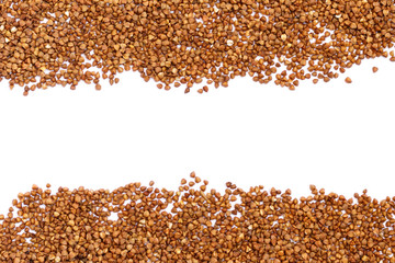 Naklejka premium dry fesh buckwheat isolated on white background. Top view.