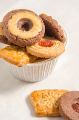 assorted cookies on wooden tray