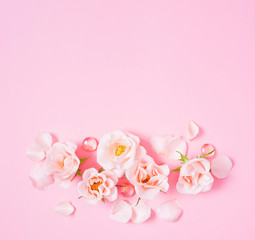 Fototapeta na wymiar Pink background with roses