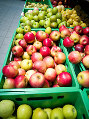 Shopping row in the store. The display of fruit.