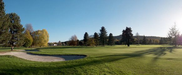 bunker on the golf course with trees