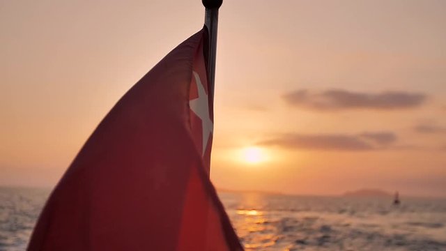 Chinese red flag flutters in wind