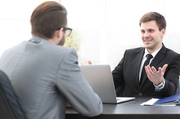 Obraz premium employees of the company talking at his workplace