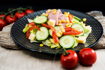 Delicious fresh salad and olive oil