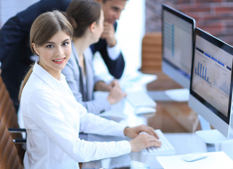 Fototapeta premium young employee sitting at a Desk