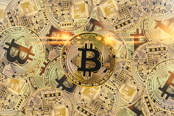 golden bitcoyne. Digital monitoring, verification and currency exchange. The concept of crypto currency. horizontal top view closeup bitcoy stack gold coins background texture sharing concepts